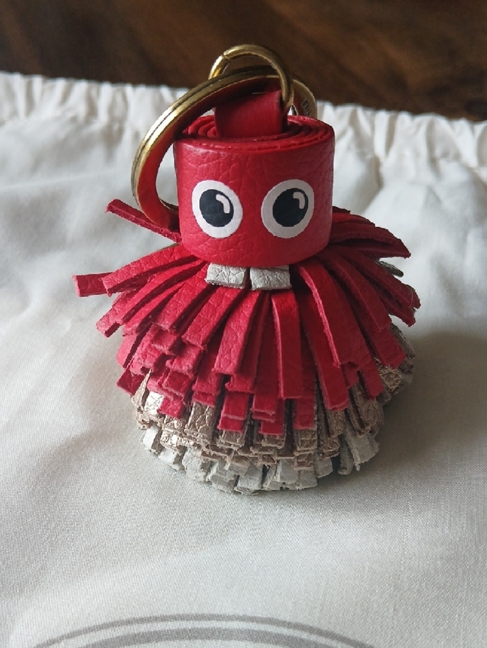 Rare Fossil Red and Beige Leather Tassel Keyring with Brass Hardware